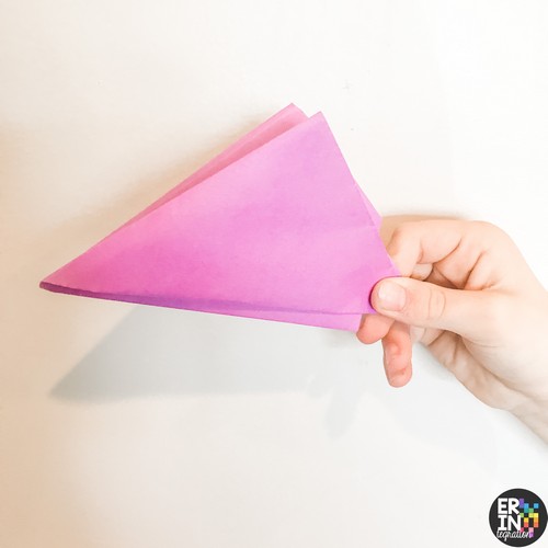 image of pink paper folded into a paper popper