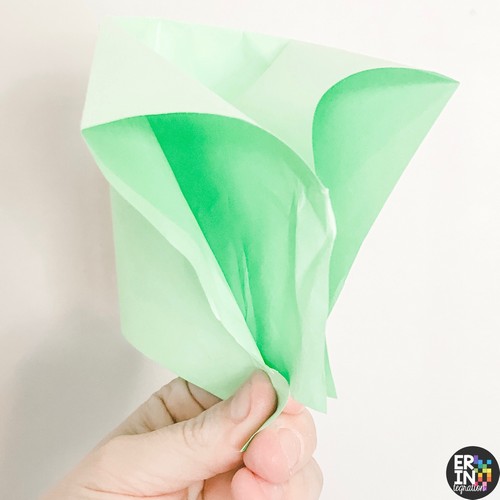 image of green paper folded into a paper popper